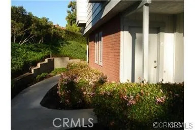 a view of a backyard of the house
