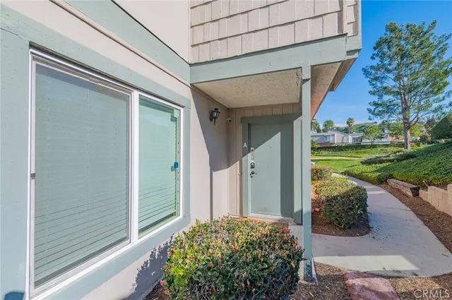 a view of an entryway with front door