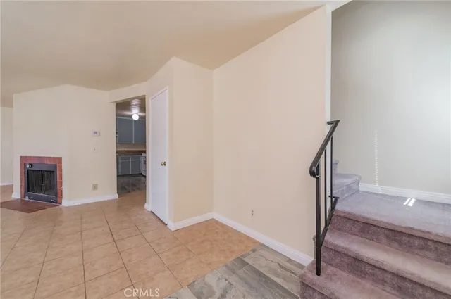 a view of empty room with windows