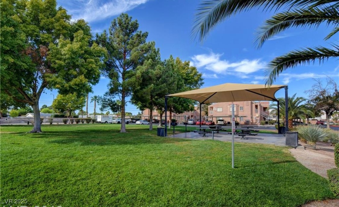 3318 North Decatur Boulevard, Unit 2103 Las Vegas, NV 89130 - Photo 18 of 20 View of community with a yard