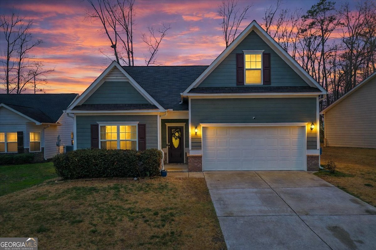 15 Gala Drive Northeast Rome, GA 30165 - Photo 1 of 60 a front view of a house with a yard and garage