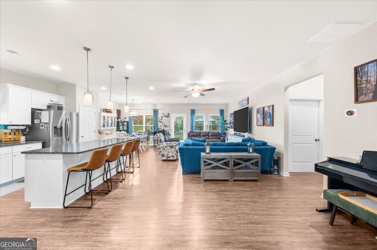 15 Gala Drive Northeast Rome, GA 30165 - Photo 12 of 60 a view of a living room kitchen and kitchen island
