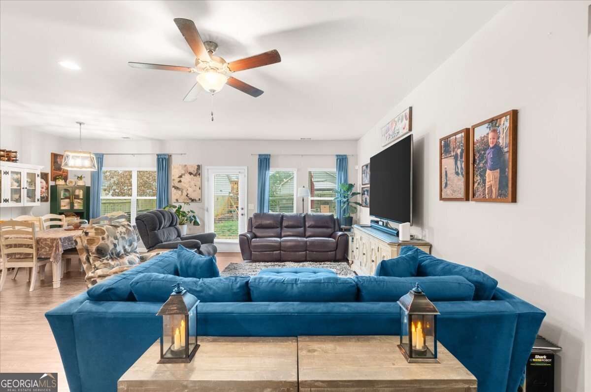 15 Gala Drive Northeast Rome, GA 30165 - Photo 14 of 60 a living room with furniture kitchen view and a large window