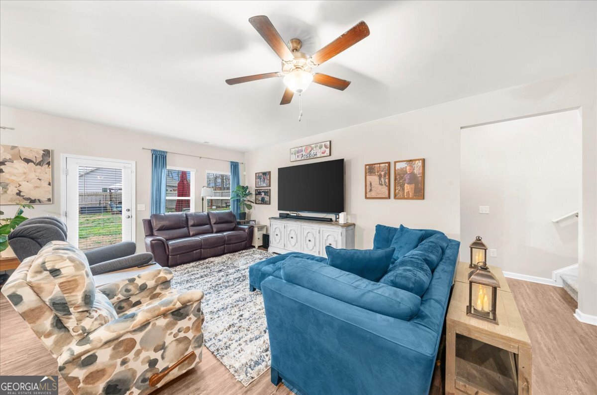 15 Gala Drive Northeast Rome, GA 30165 - Photo 15 of 60 a living room with furniture and a flat screen tv