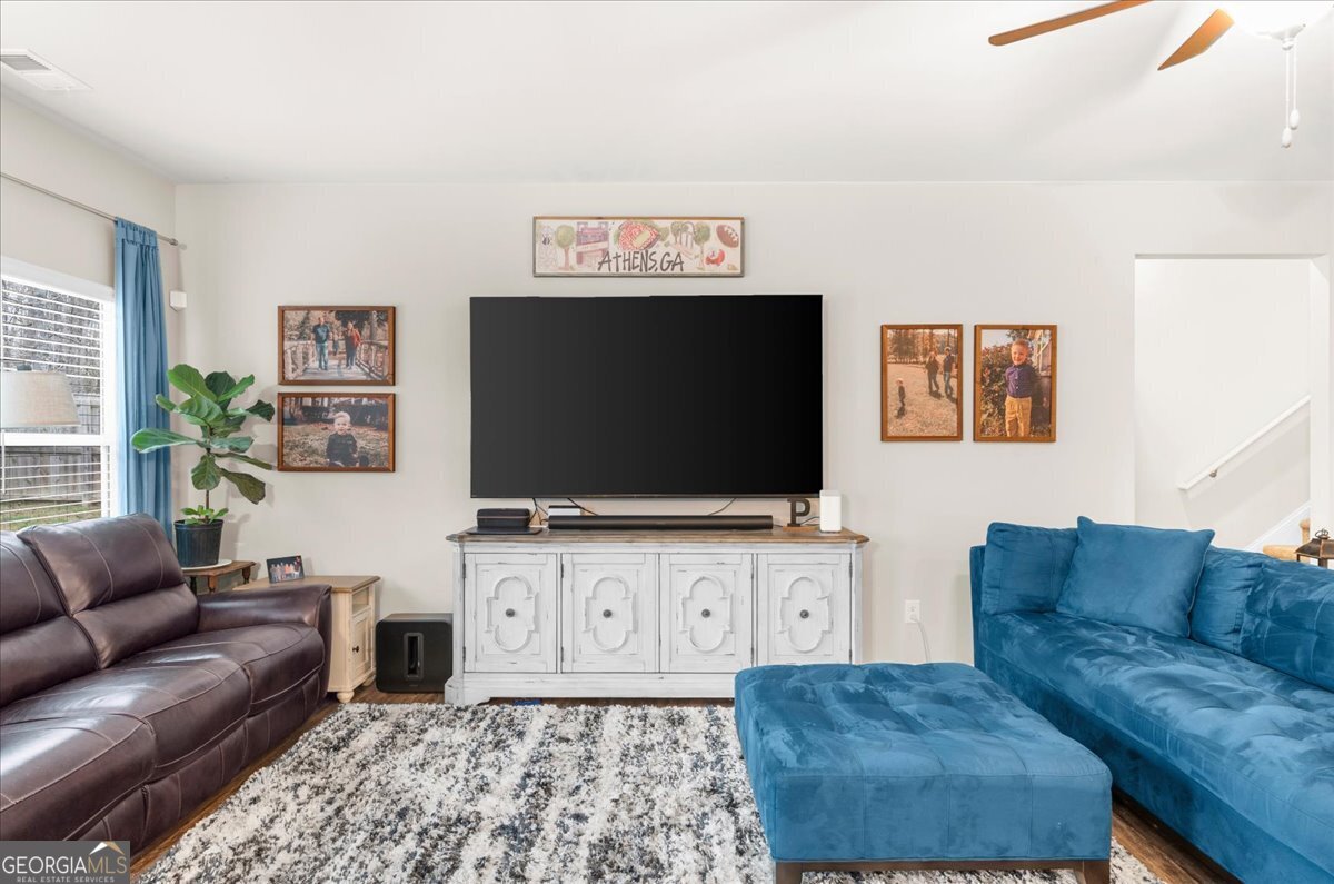 15 Gala Drive Northeast Rome, GA 30165 - Photo 17 of 60 a living room with furniture and a flat screen tv
