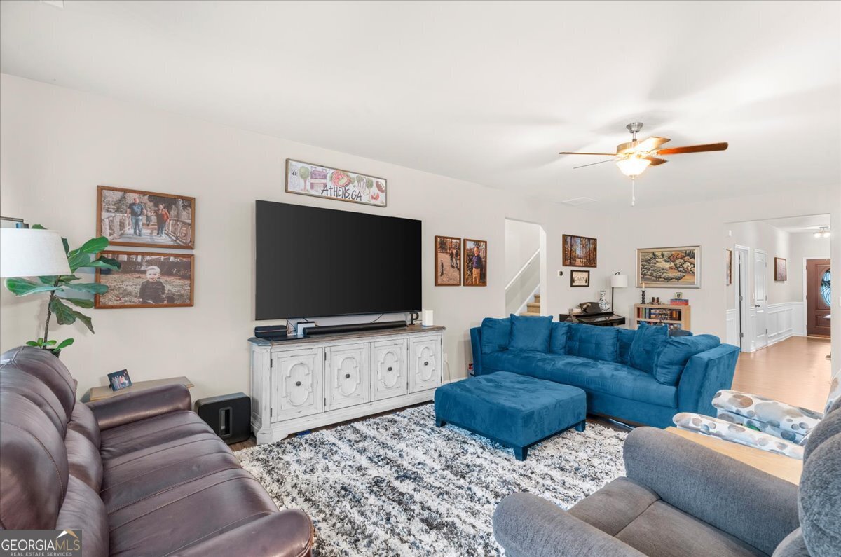 15 Gala Drive Northeast Rome, GA 30165 - Photo 18 of 60 a living room with furniture and a flat screen tv