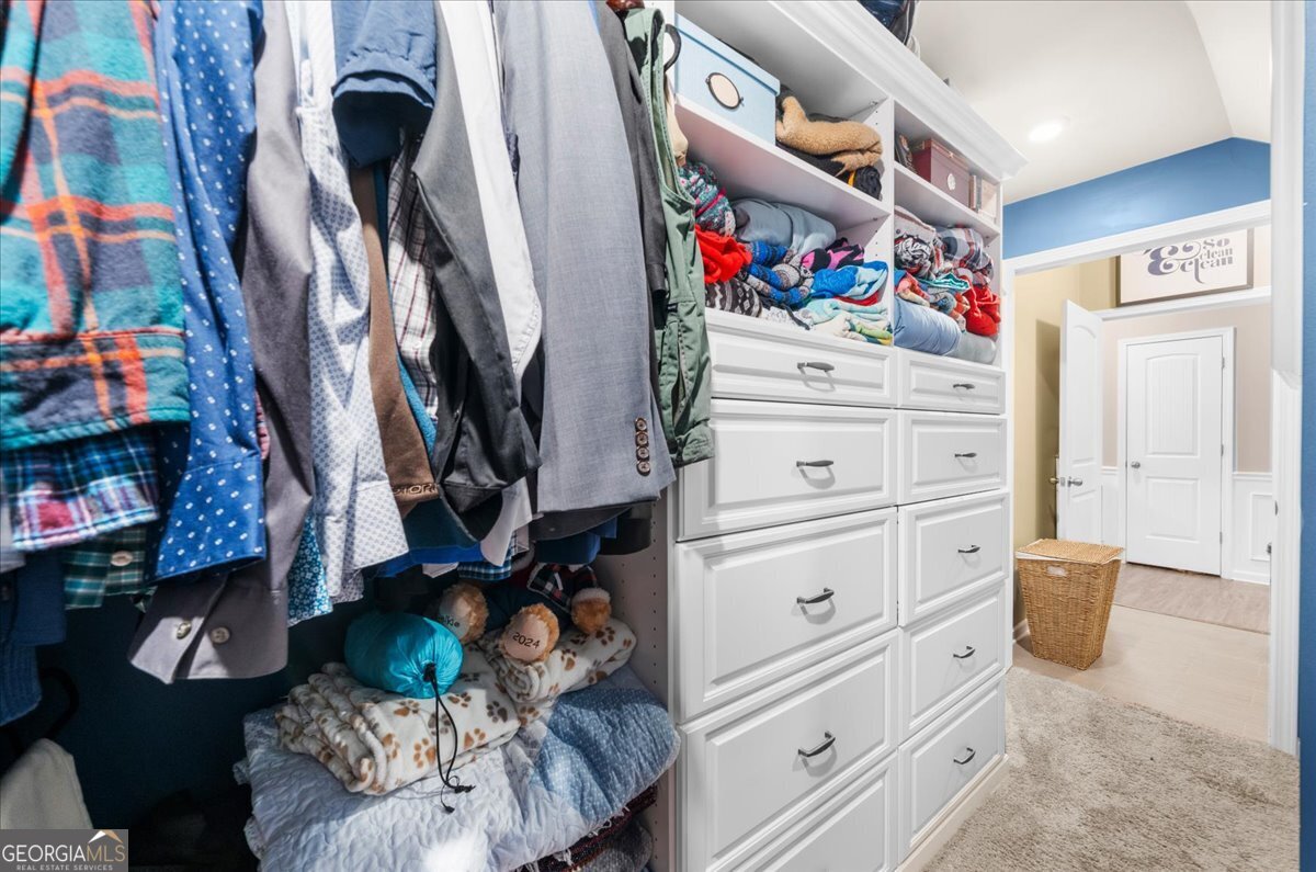 15 Gala Drive Northeast Rome, GA 30165 - Photo 41 of 60 a view of walk in closet with clothes