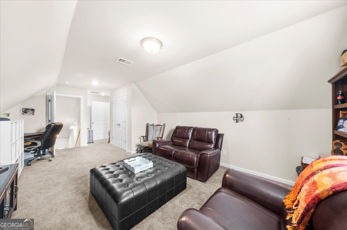 15 Gala Drive Northeast Rome, GA 30165 - Photo 42 of 60 a living room with furniture rug and a table