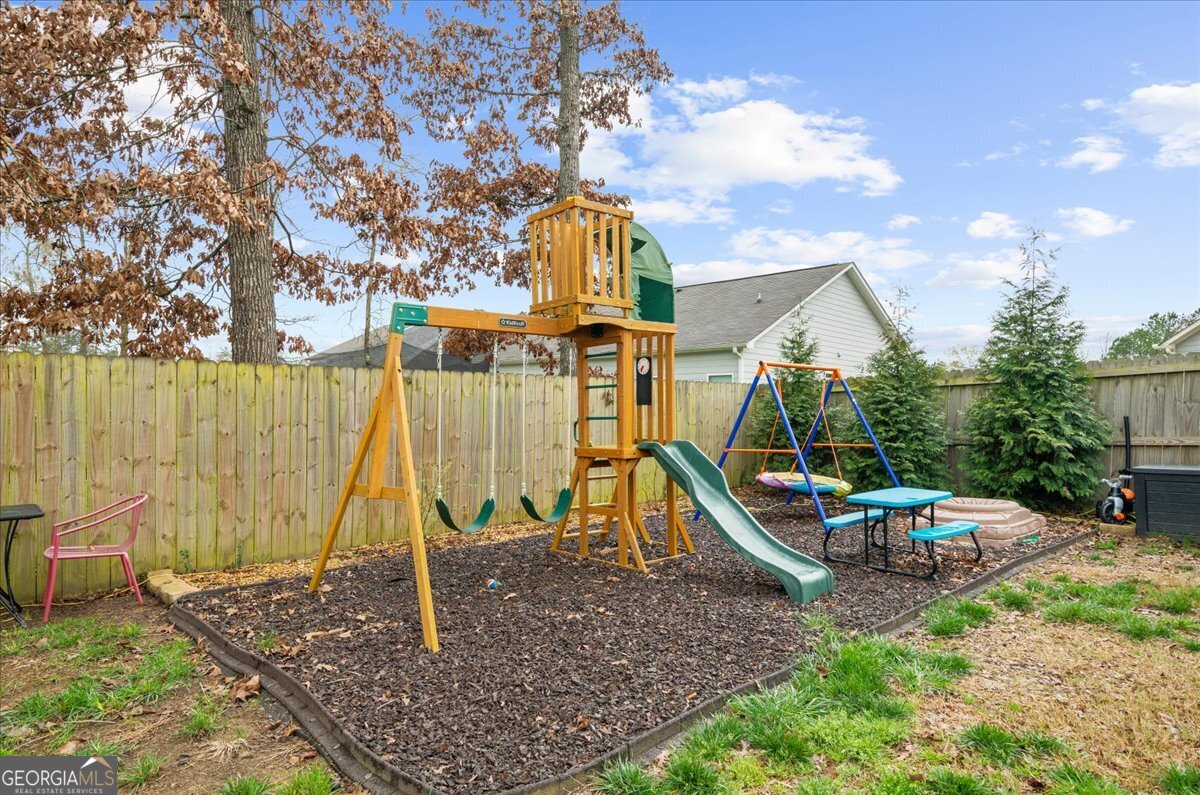 15 Gala Drive Northeast Rome, GA 30165 - Photo 47 of 60 a view of a park with swings
