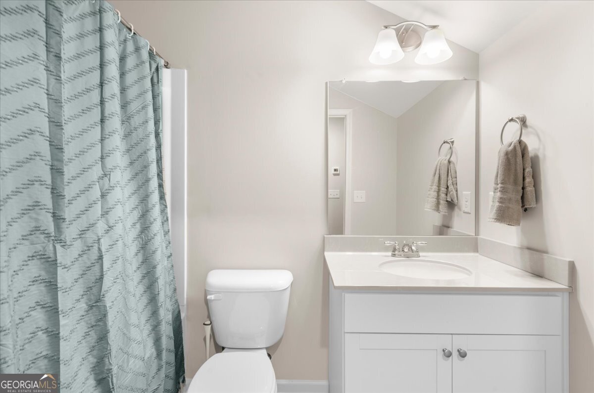 15 Gala Drive Northeast Rome, GA 30165 - Photo 48 of 60 a bathroom with a sink toilet and shower