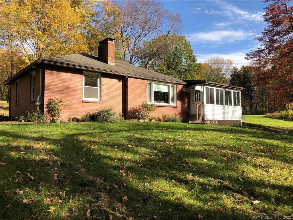 30 Morgan Road Canton, CT 06019 - Photo 1 of 1 a front view of house with yard and green space