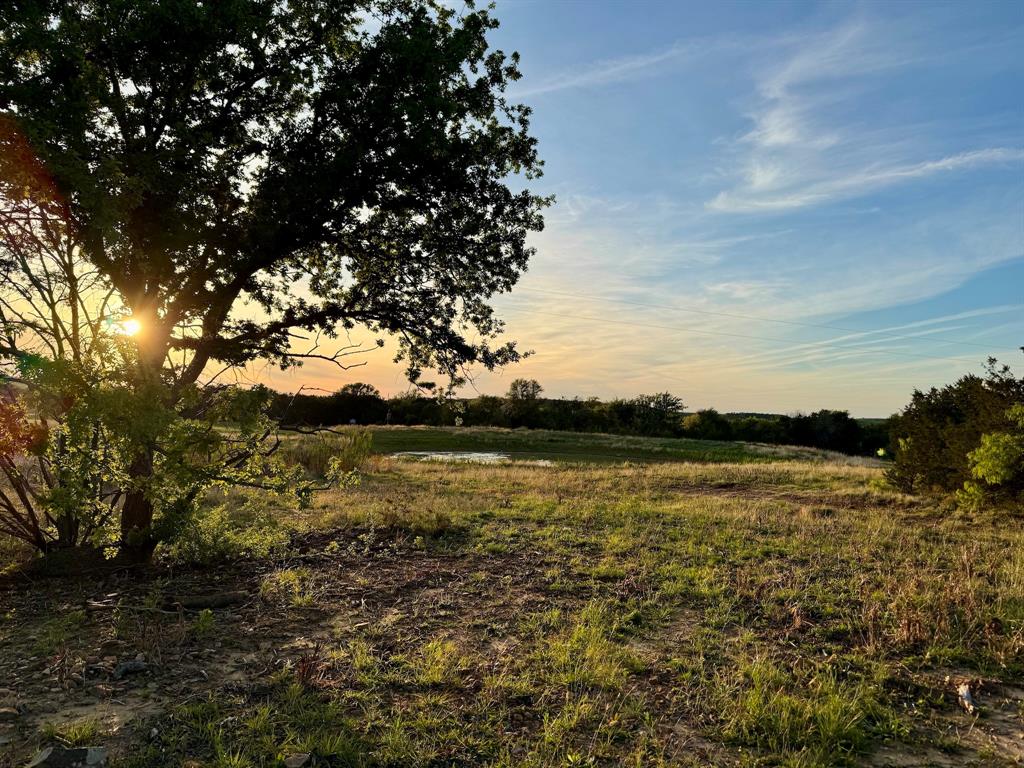 16811 County Road 107 Mingus, TX 76463 - Photo 23 of 38 a view of an ocean from a yard