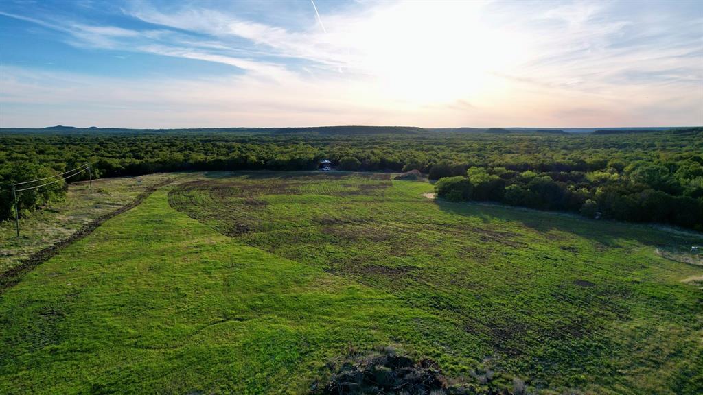 16811 County Road 107 Mingus, TX 76463 - Photo 4 of 38 a view of an ocean with a houses