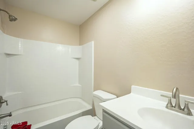 a view of backyard and windows