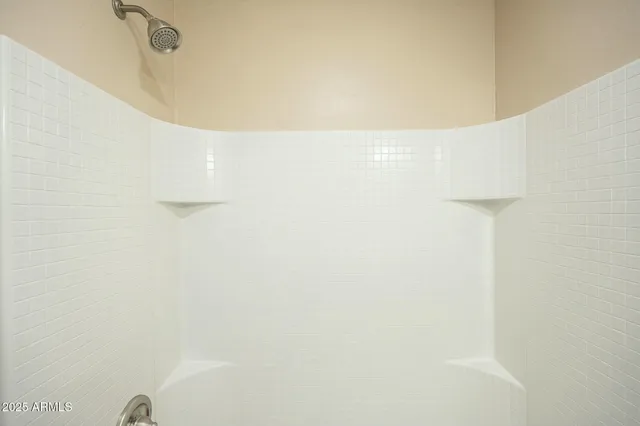 a view of swimming pool with outdoor seating and yard in back