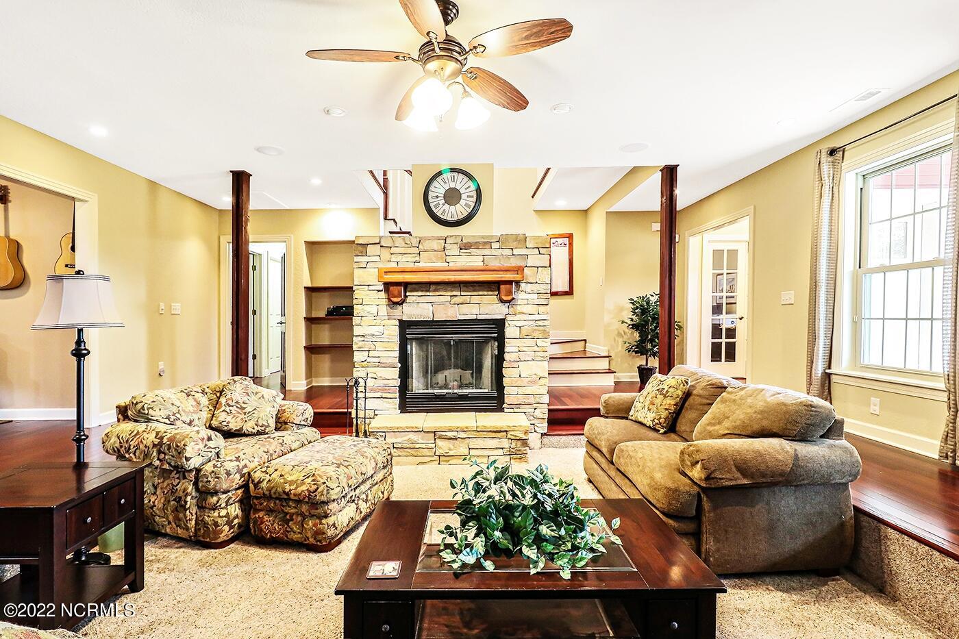 1079 Tulls Creek Road Moyock, NC 27958 - Photo 13 of 59 Great Room with stone fireplace.