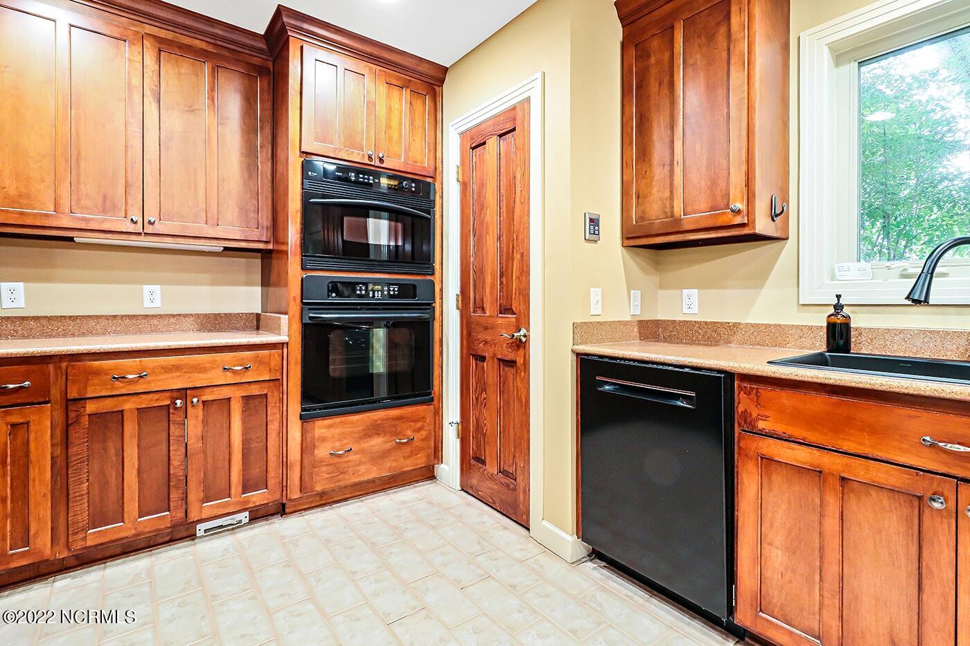 1079 Tulls Creek Road Moyock, NC 27958 - Photo 21 of 59 All appliances convey including refrigerator, dishwasher, cooktop, wall oven and advantium oven/microwave.