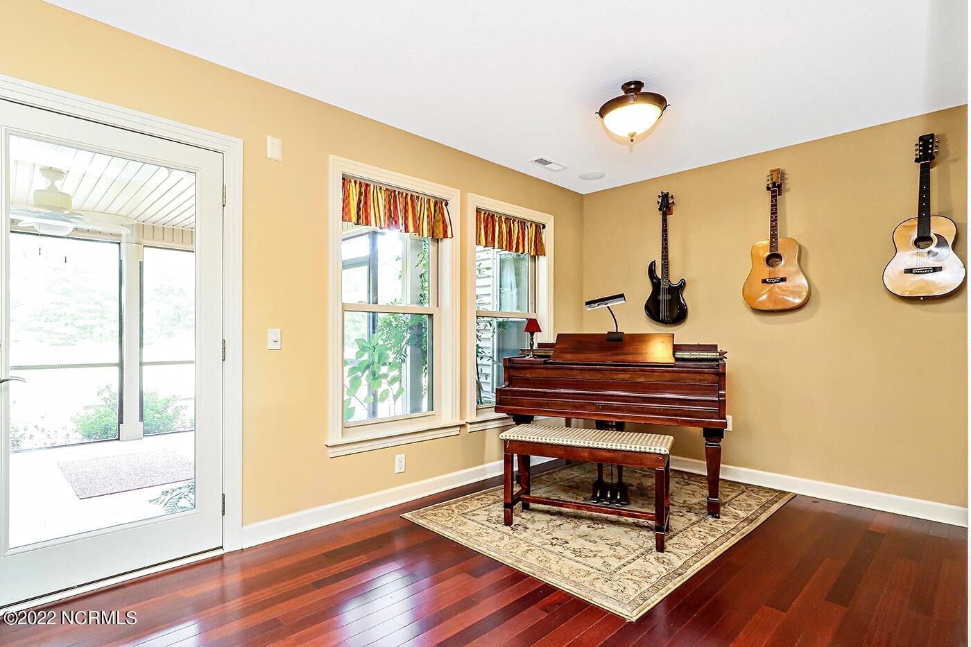 1079 Tulls Creek Road Moyock, NC 27958 - Photo 26 of 59 Dining Area of the Eat in Kitchen is currently being used as a music room.