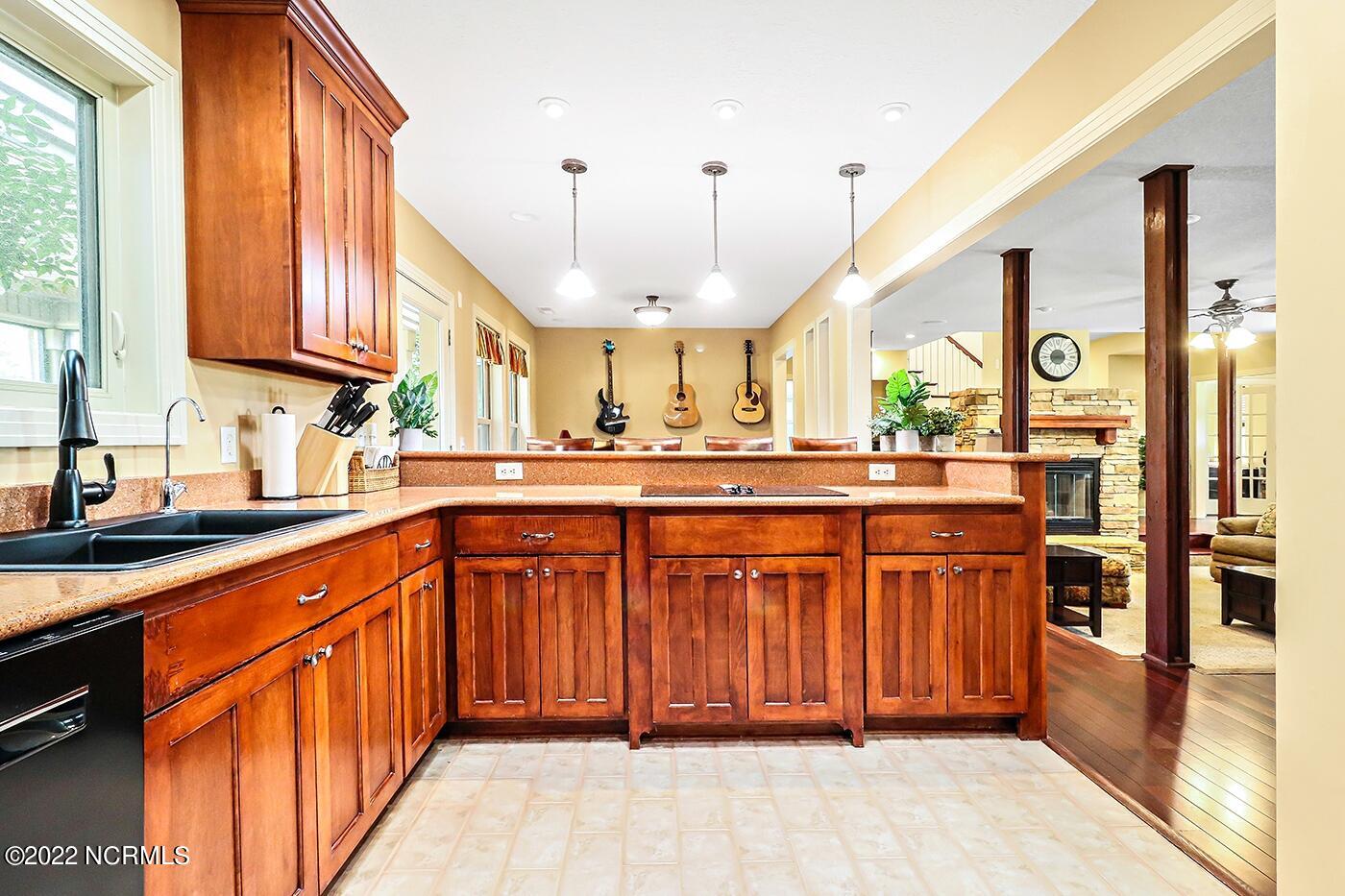 1079 Tulls Creek Road Moyock, NC 27958 - Photo 27 of 59 Just off the Eat in Kitchen is the access door leading to the Screened Porch.