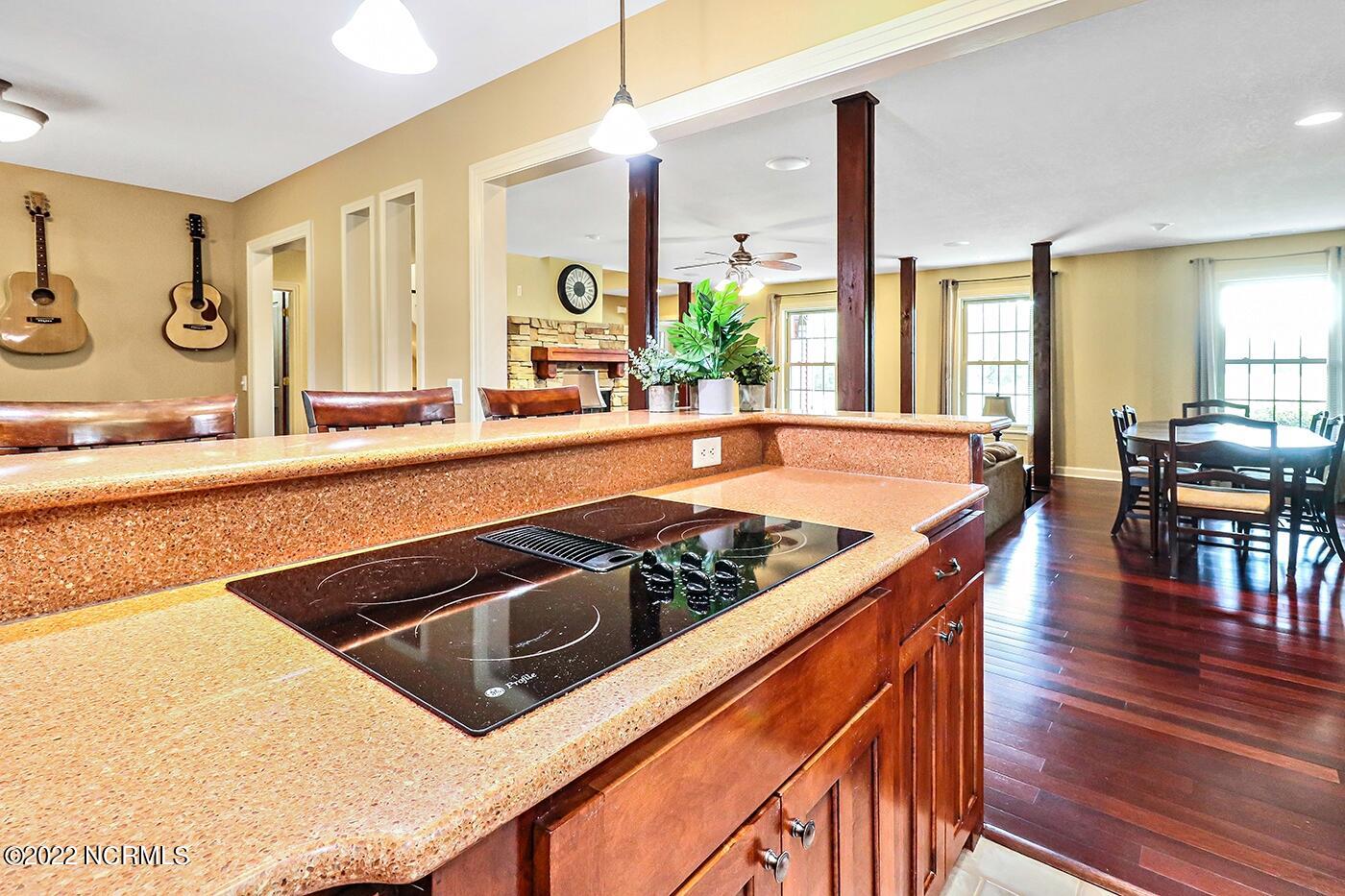 1079 Tulls Creek Road Moyock, NC 27958 - Photo 28 of 59 View to the Great Room and Formal Dining area from the Eat in Kitchen.