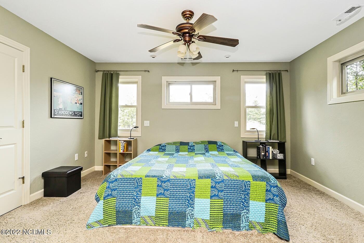 1079 Tulls Creek Road Moyock, NC 27958 - Photo 31 of 59 First Floor Owner’s Suite with large walk in closet and full bath