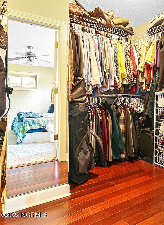1079 Tulls Creek Road Moyock, NC 27958 - Photo 35 of 59 Large Walk in Closet in First Floor Owner’s Suite features hardwood flooring.