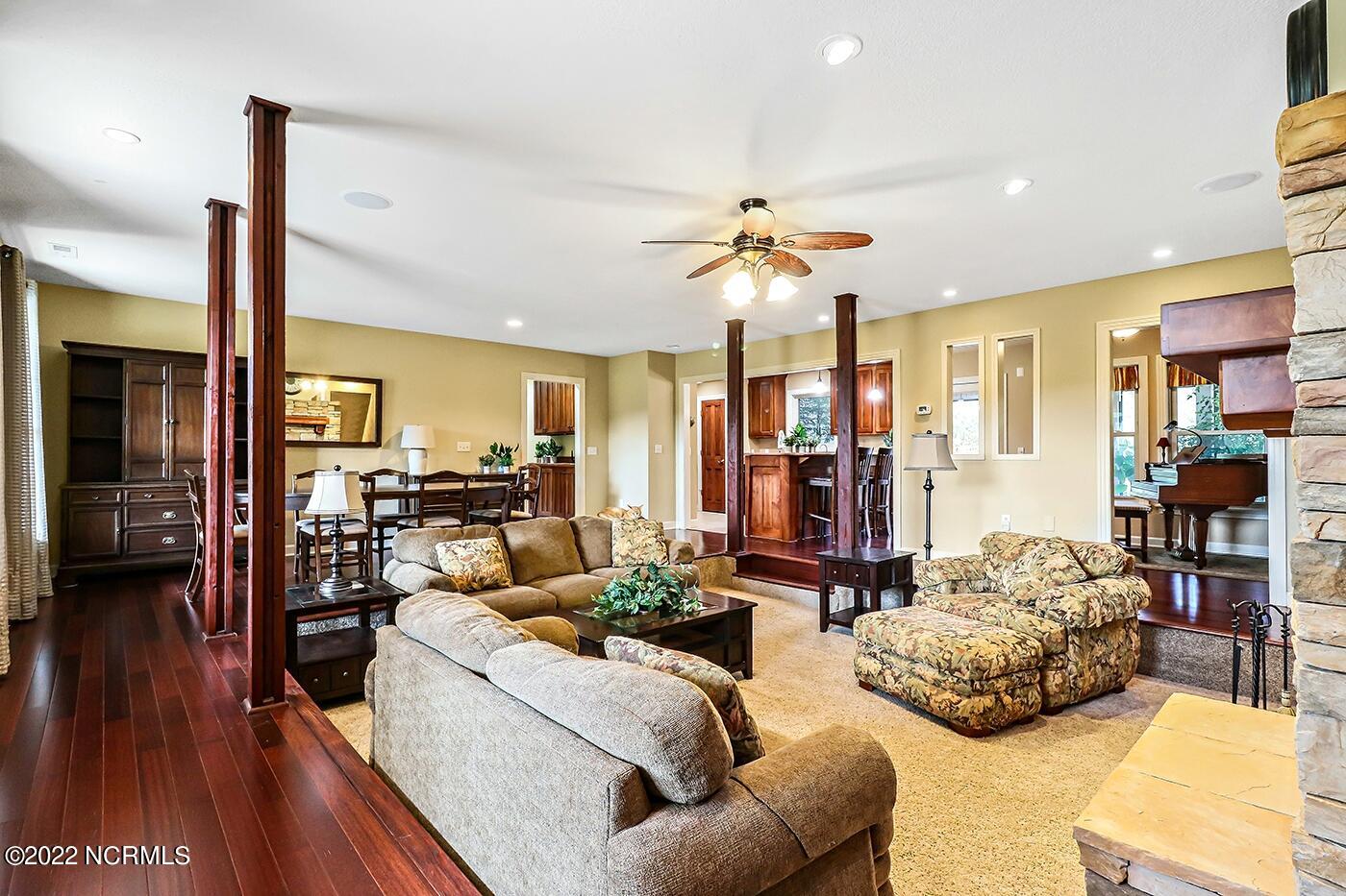 1079 Tulls Creek Road Moyock, NC 27958 - Photo 10 of 59 Classic and exceptional details in this well maintained and lovingly cared for Home. Eat in Kitchen opens to the Great Room with stone Fireplace,