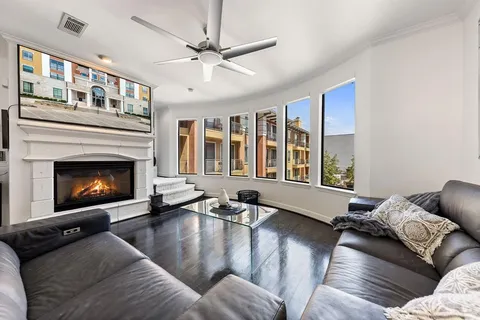 a living room with furniture or fireplace and a large window