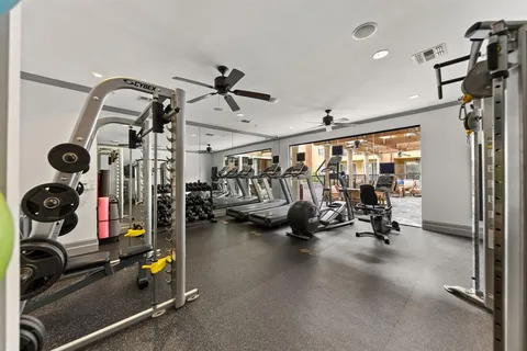 a view of a room with gym equipment
