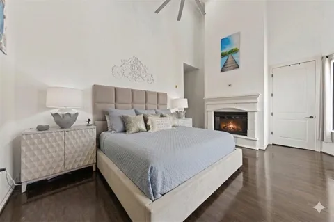 a bed room with a bed and a fireplace