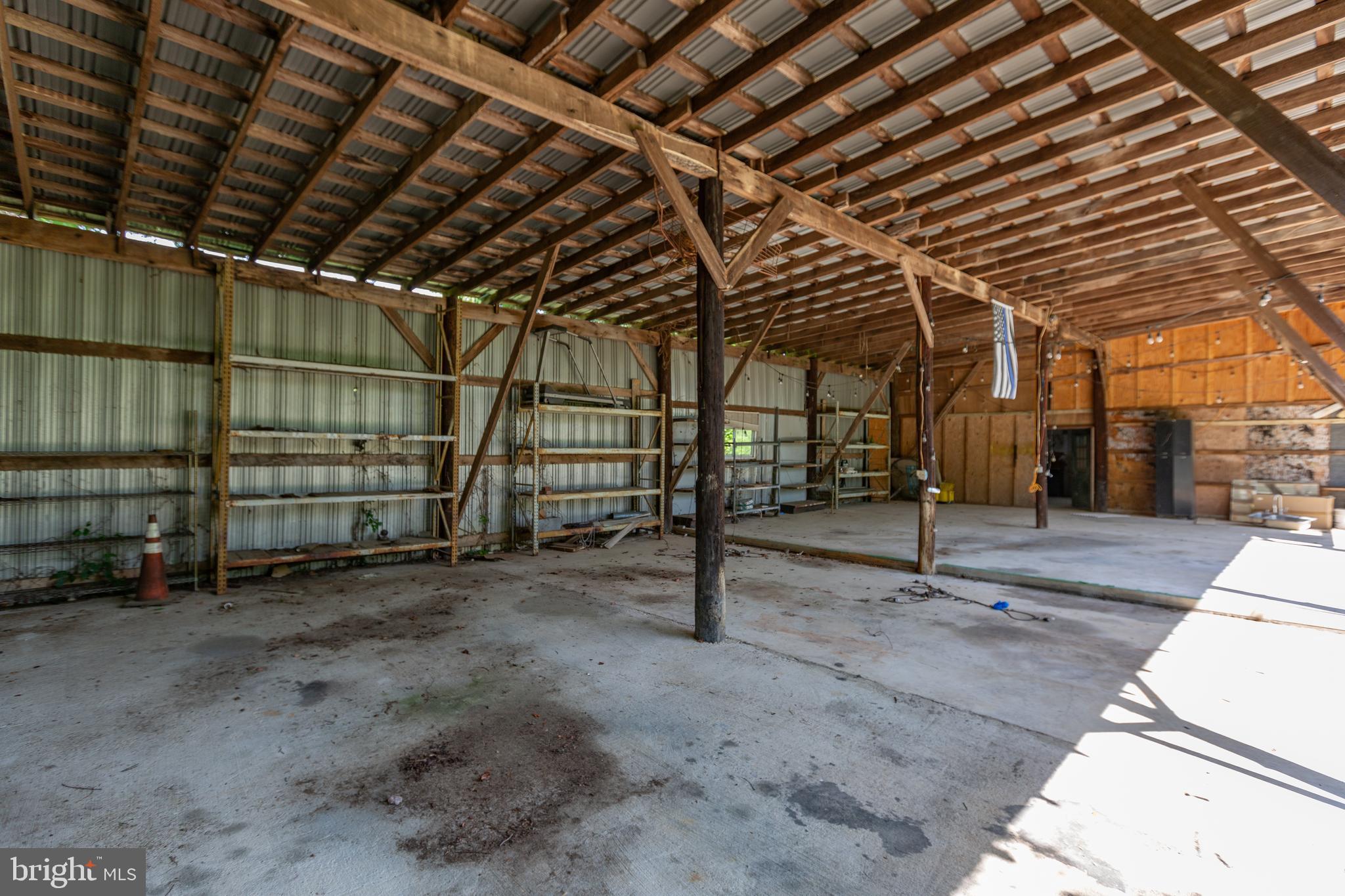 10827 Catharpin Road Spotsylvania, VA 22553 - Photo 34 of 39 a view of empty room with wooden ceiling
