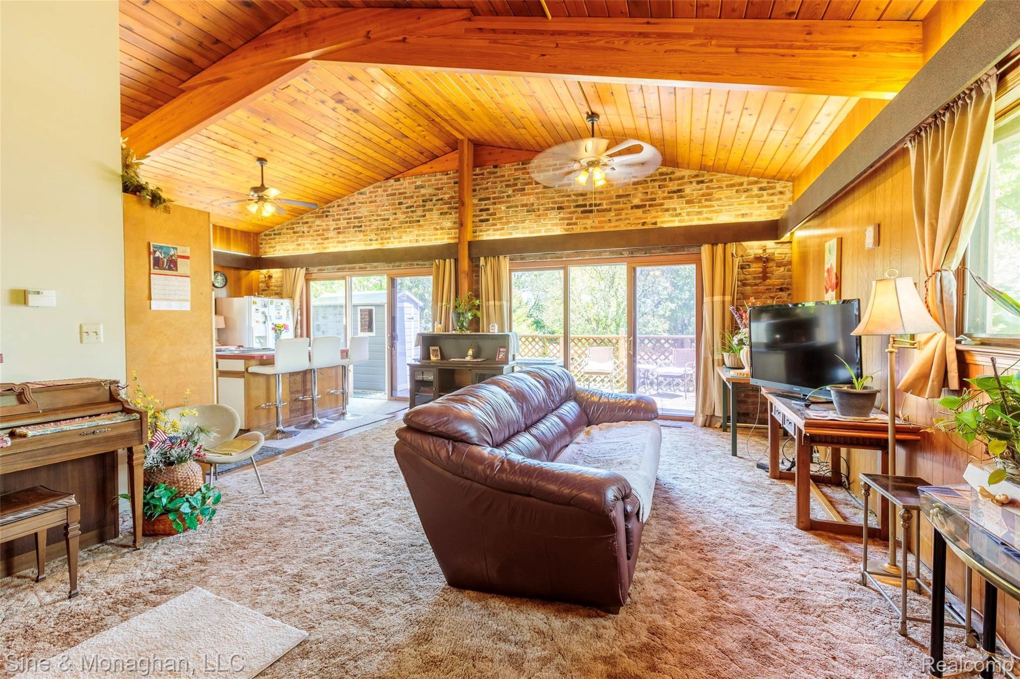 2437 River Road St. Clair, MI 48079 - Photo 19 of 68 20 LIVING ROOM W CEDAR PLANKED CEILING 2437 River Rd.jpg