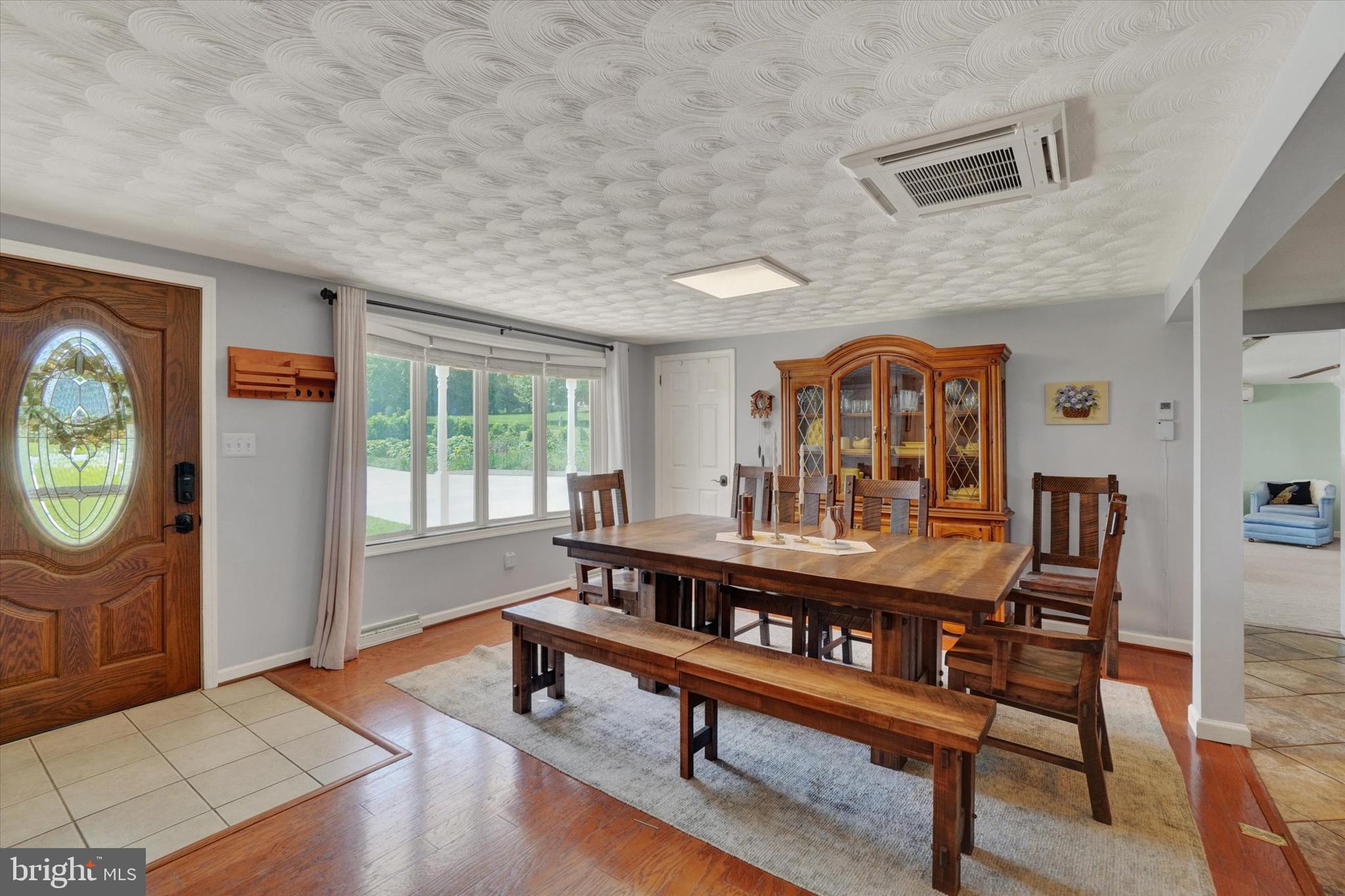 13174 Mont Road Felton, PA 17322 - Photo 22 of 39 a living room with furniture a rug and a window