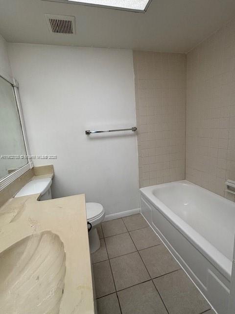 9235 Southwest 8th Street, Unit 510 Boca Raton, FL 33428 - Photo 12 of 23 a bathroom with a bathtub and toilet