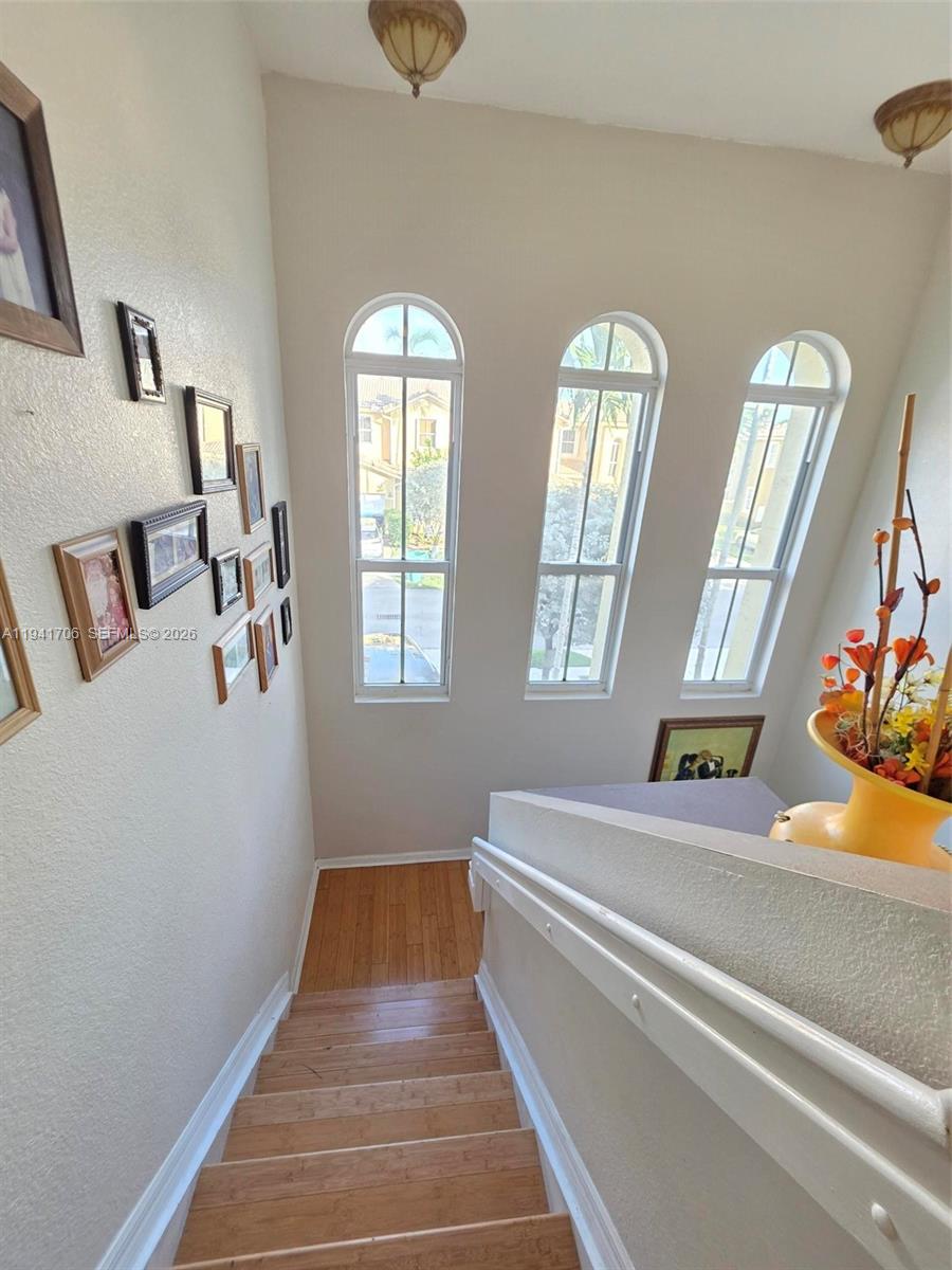 11702 Southwest 137th Place Miami, FL 33186 - Photo 27 of 30 a view of an entryway with wooden floor