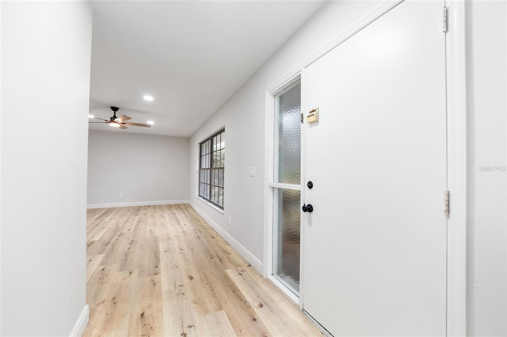 320 Southeast 41st Avenue Ocala, FL 34471 - Photo 5 of 45 a view of hallway with wooden floor