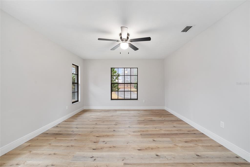 320 Southeast 41st Avenue Ocala, FL 34471 - Photo 10 of 45 a view of an empty room with a window