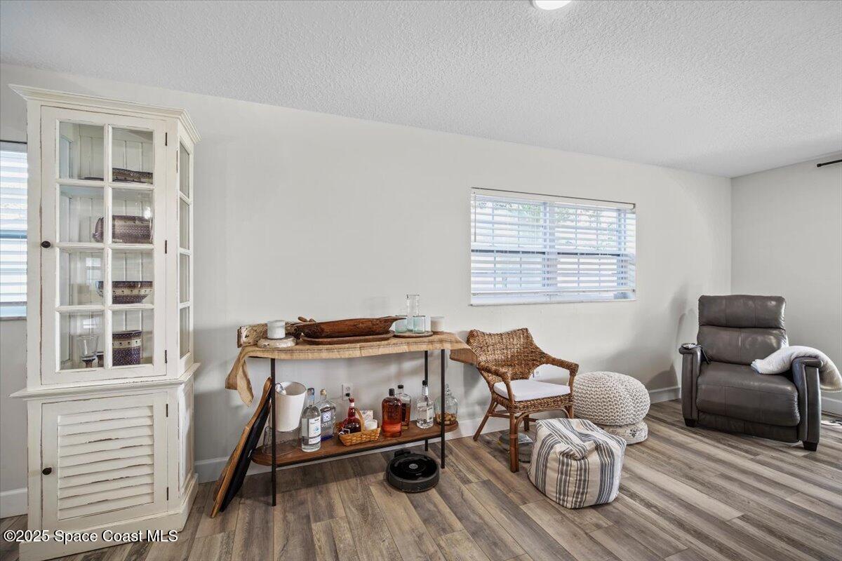1158 Samar Road Cocoa Beach, FL 32931 - Photo 15 of 29 a livingroom with furniture and a window