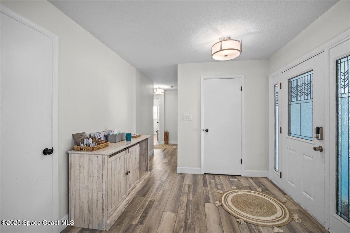 1158 Samar Road Cocoa Beach, FL 32931 - Photo 6 of 29 a bathroom with a sink a toilet and shower