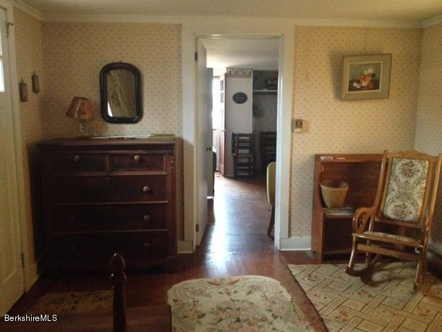 374 W Road Lee, MA 01238 - Photo 4 of 15 a view of a workspace with furniture and mirror
