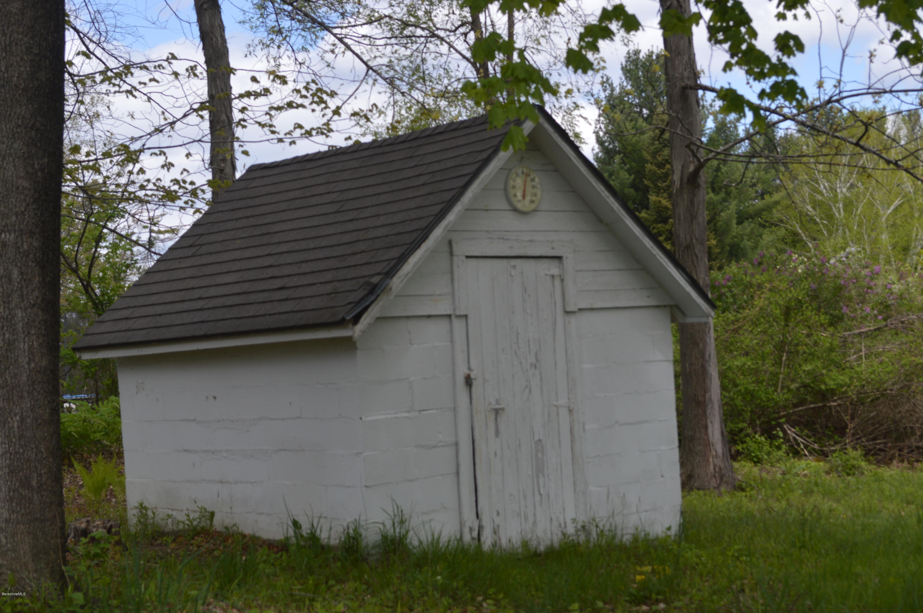 374 W Road Lee, MA 01238 - Photo 5 of 15 a backyard of a house with lots of green space
