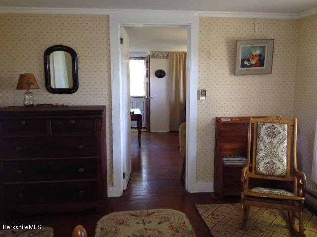 374 W Road Lee, MA 01238 - Photo 8 of 15 a view of a livingroom with furniture and wooden floor