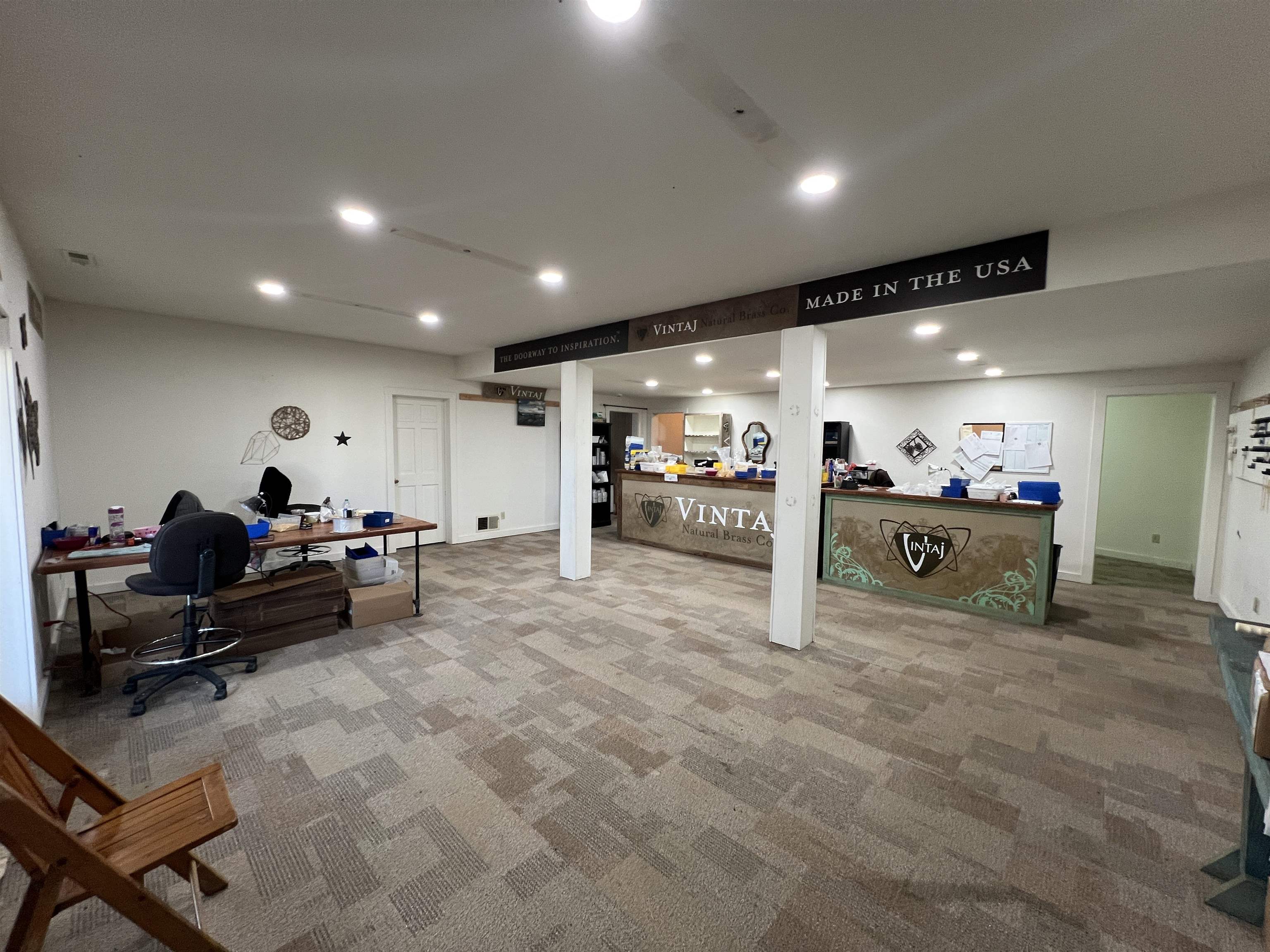 5140 Highway 20 Galena, IL 61036 - Photo 16 of 38 a living room with furniture and a chandelier