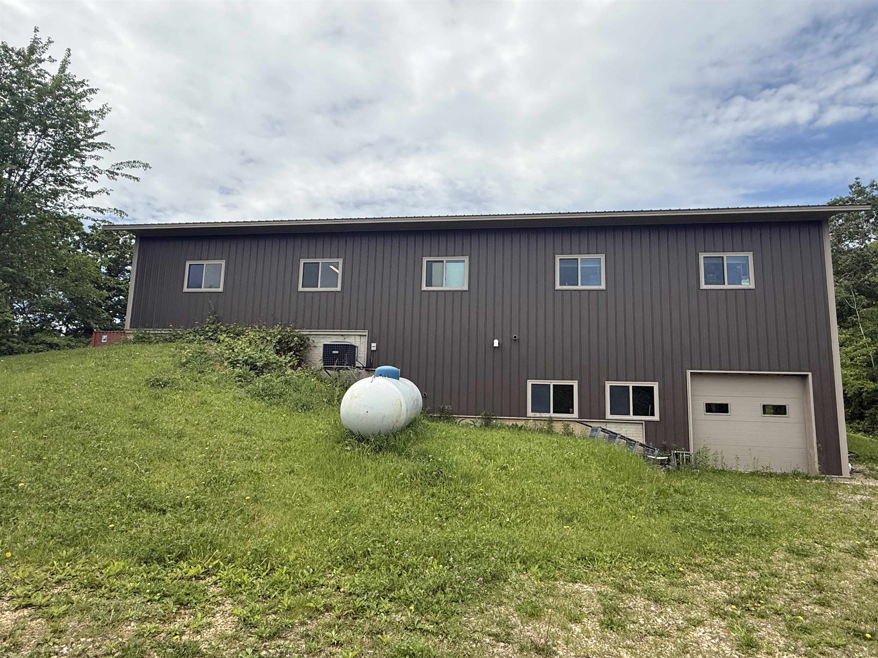 5140 Highway 20 Galena, IL 61036 - Photo 21 of 38 a front view of a house with garden
