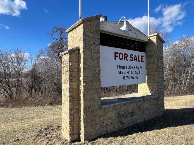 a view of a garden from a balcony