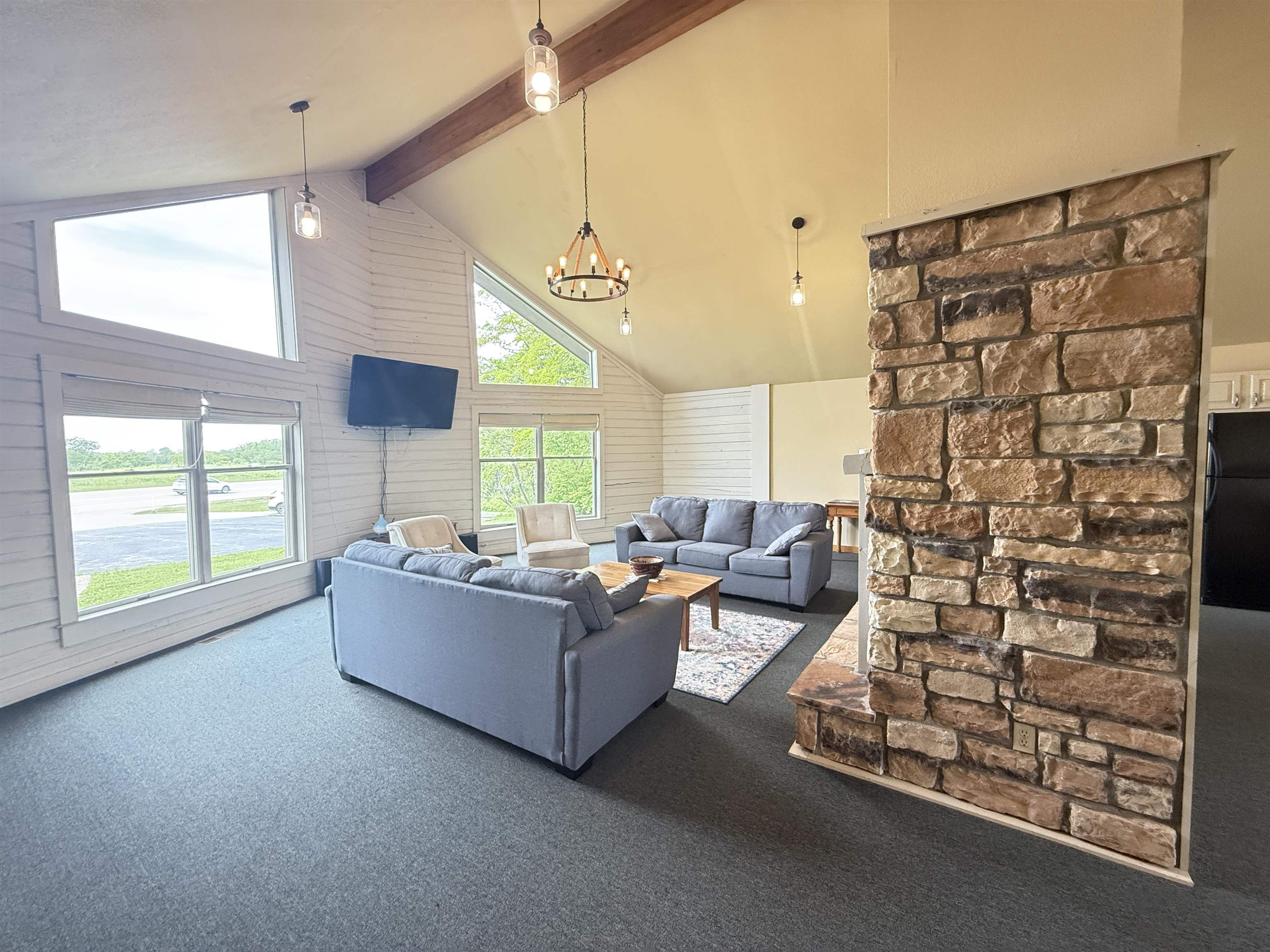 5140 Highway 20 Galena, IL 61036 - Photo 6 of 38 a living room with furniture and a flat screen tv