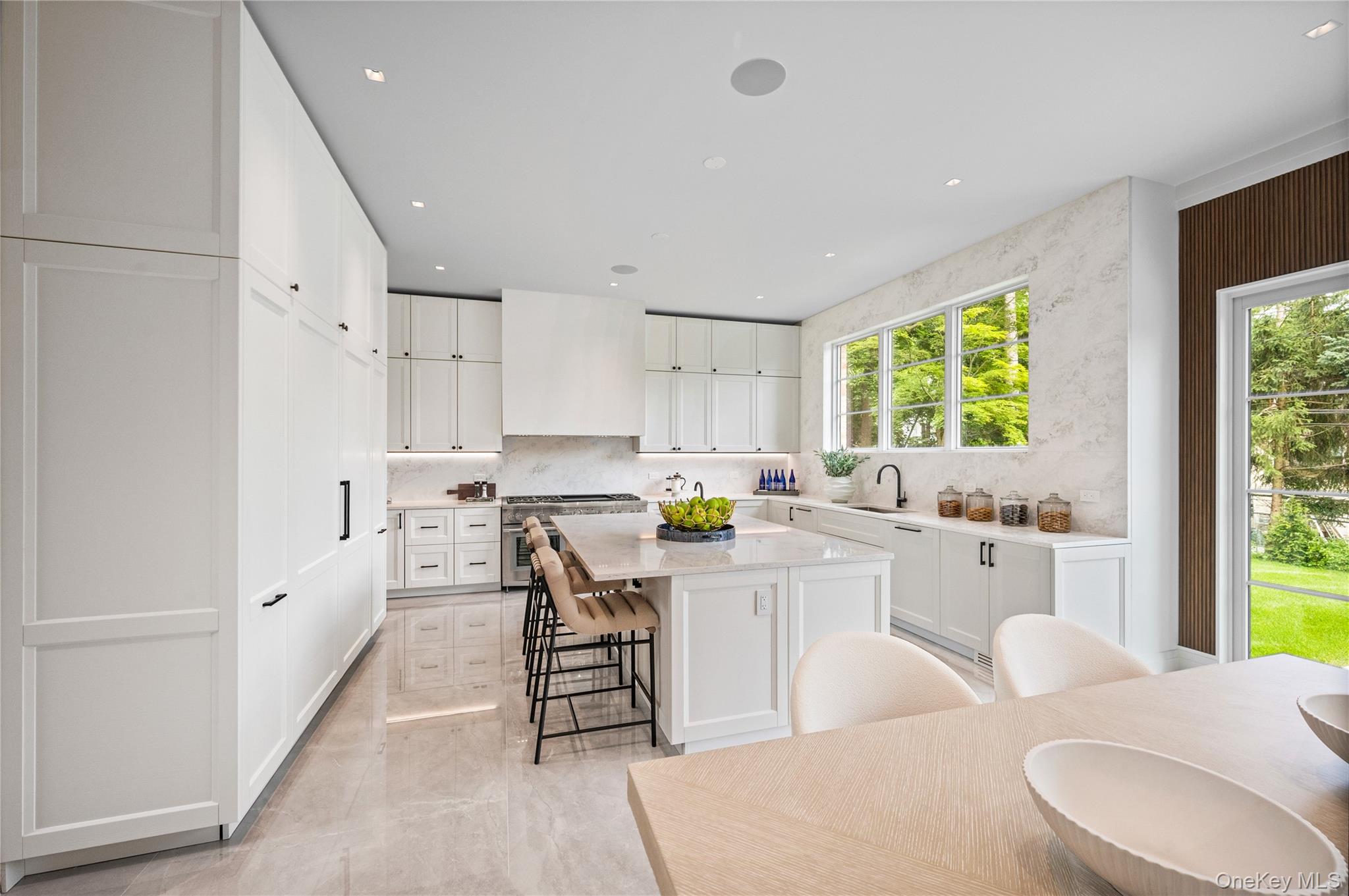 7 Mirrielees Road Great Neck, NY 11021 - Photo 15 of 47 a kitchen with counter space appliances and a window