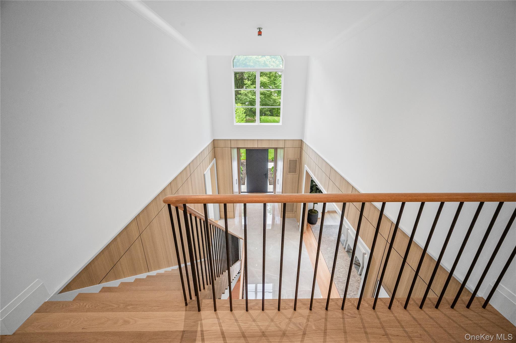 7 Mirrielees Road Great Neck, NY 11021 - Photo 31 of 47 a view of staircase with window