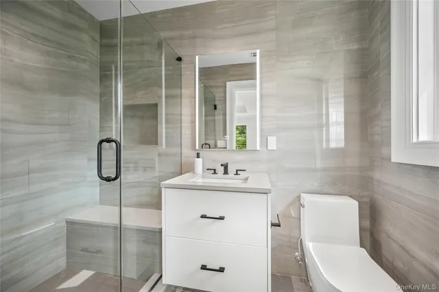 a view of a hallway with stairs