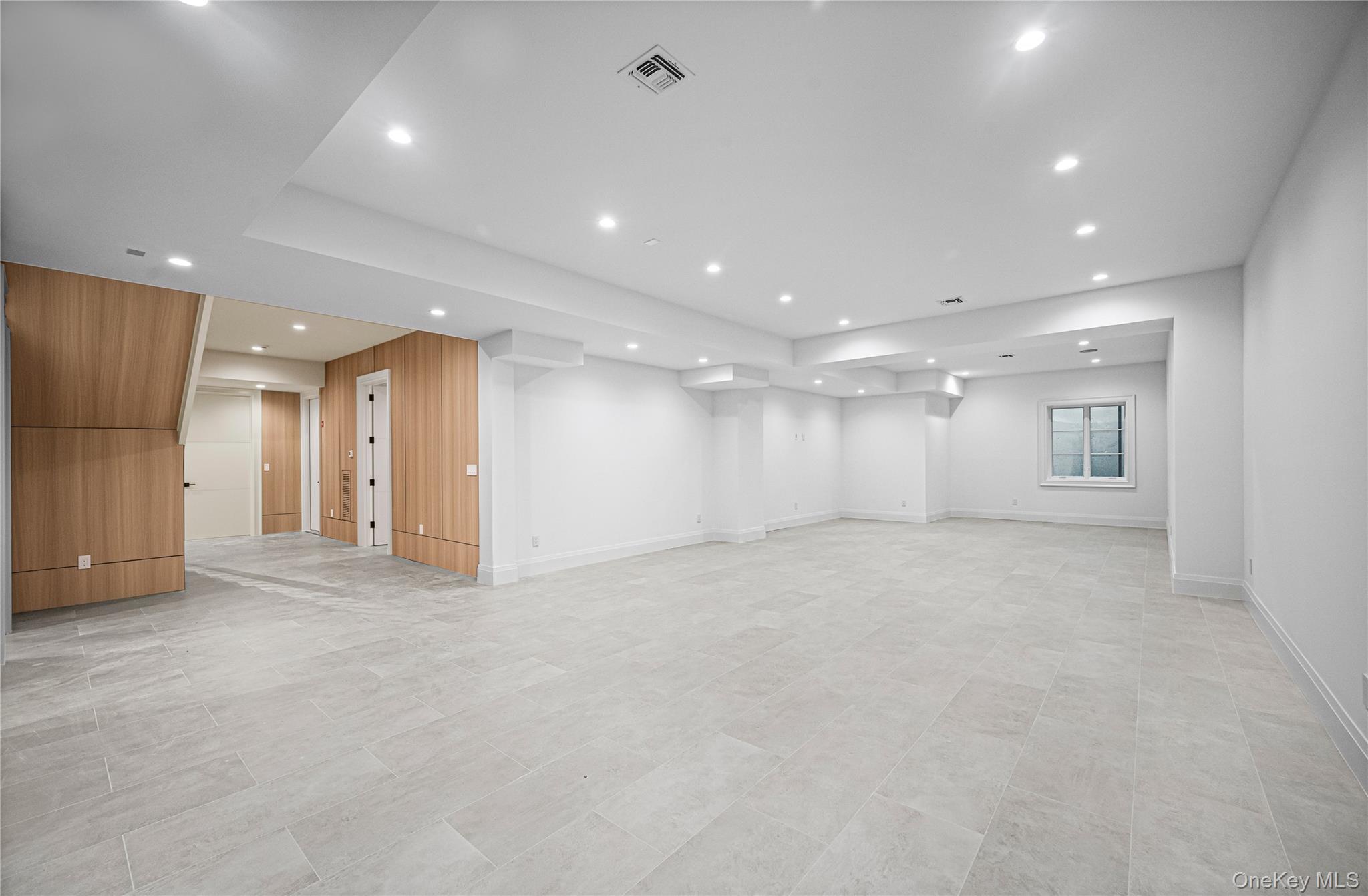 7 Mirrielees Road Great Neck, NY 11021 - Photo 42 of 47 a view of an empty room